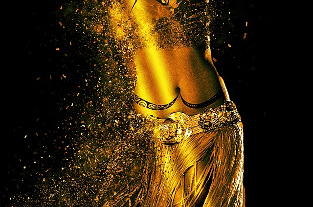 An Image Showcasing A Graceful Belly Dancer, Adorned In Vibrant, Flowing Silk Garments, Gracefully Moving To The Hypnotic Beats Of Arabic Music