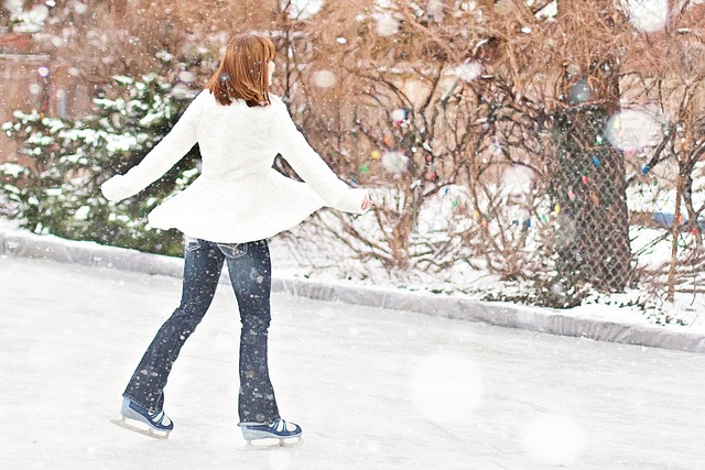 An Image Of A Skilled Ice Skater Executing A Flawless Vertical Figure Eight, Effortlessly Gliding Across The Ice