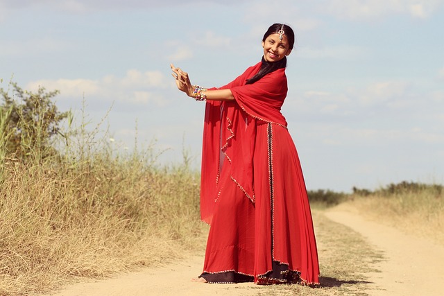 An Image Showcasing The Vibrant Essence Of Indian Belly Dancing: A Graceful Female Dancer Adorned In Traditional Attire, Swaying Her Hips With Intricately Woven Finger Cymbals, As Her Ornate Jewelry Shimmers And Her Expressive Eyes Captivate The Audience